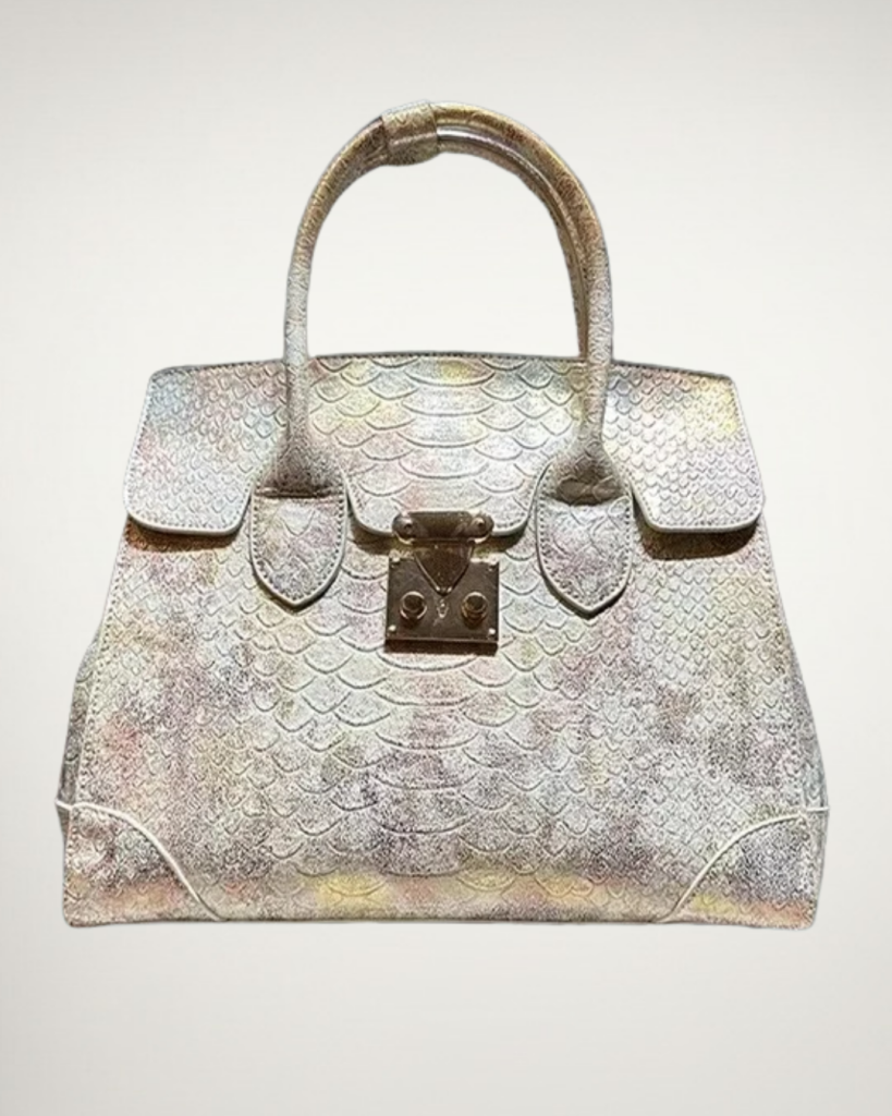 A photograph of The Azure Viper Leather Bag by Jazzberry Street.